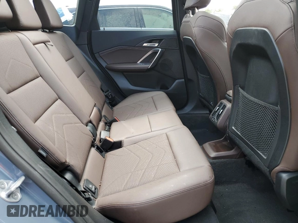 2023 BMW X1 xDrive28i with VIN WBX73EF08P5W51452, listed as a Copart auction lot 58420175 with 30,404 mi miles and Salvage title. Bid and sale history available at DreamBid. Image 11.