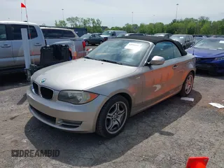 2011 BMW 1 Series 128i with VIN WBAUL7C5XBVE87044, listed as a IAAI auction lot 42095602 with 163,049 mi miles and . Bid and sale history available at carsss.com. Image 2.