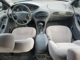1999 Ford Taurus SE z VIN 1FAFP58S2XA261374, wystawiony jako Copart lot #74180494 z przebiegiem 193 416 mil mil oraz Szkody całkowita. Historia ofert i sprzedaży dostępna na DreamBid. Obrazek 8.