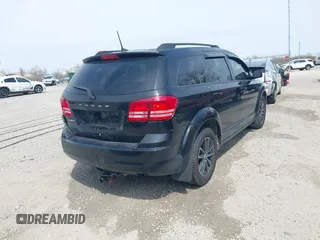 2018 Dodge Journey SE with VIN 3C4PDCAB7JT529454, listed as a IAAI auction lot 42066676 with 89,404 mi miles and . Bid and sale history available at carsss.com. Image 4.