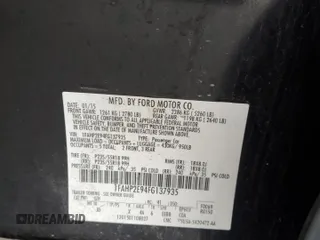 2015 Ford Taurus SEL with VIN 1FAHP2E94FG137935, listed as a Copart auction lot 80921824 with 172,324 mi miles and Salvage Title. Bid and sale history available at DreamBid. Image 12.