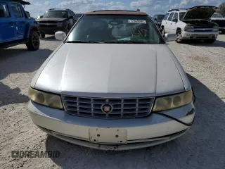 2003 Cadillac Seville Luxury SLS z VIN 1G6KS54Y03U289834, wystawiony jako Copart lot #77362694 z przebiegiem Nie podano mil oraz Szkoda całkowita • Salvage title. Historia ofert i sprzedaży dostępna na DreamBid. Obrazek 5.