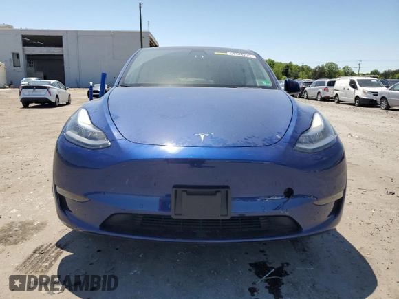 2022 Tesla Model Y Long Range z VIN 7SAYGDEEXNF444122, wystawiony jako Copart lot #54344735 z przebiegiem 33 230 mil mil oraz Szkody całkowita. Historia ofert i sprzedaży dostępna na DreamBid. Obrazek 5.