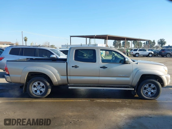 2005 Toyota Tacoma PreRunner with VIN 3TMKU72N55M003169, listed as a IAAI auction lot 41337937 with 142,474 mi miles. Bid and sale history available at carsss.com. Image 13.
