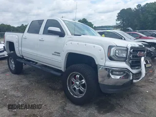 2016 GMC Sierra 1500 SLE with VIN 3GTU2MEC5GG223016, listed as a IAAI auction lot 42457634 with 165,619 mi miles and . Bid and sale history available at DreamBid. Image 1.