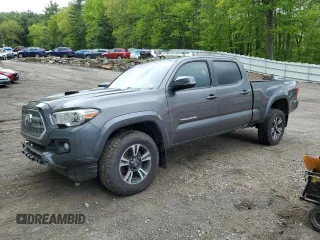 2017 Toyota Tacoma SR5 z VIN 3TMDZ5BN6HM017990, wystawiony jako Copart lot #57982205 z przebiegiem 51 890 mil mil oraz Szkoda całkowita • Salvage title. Historia ofert i sprzedaży dostępna na DreamBid. Obrazek 1.