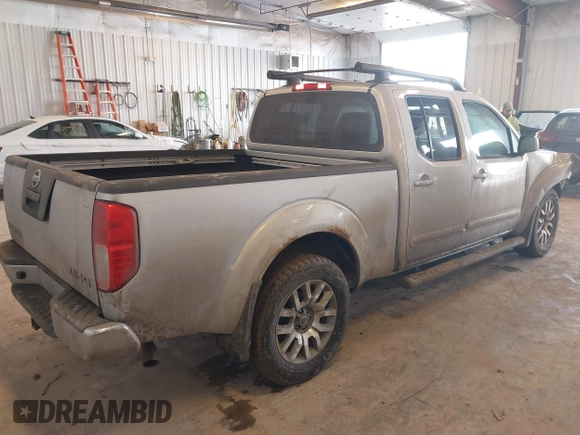 2010 Nissan Frontier SE with VIN 1N6AD0FV5AC439977, listed as a IAAI auction lot 41666404 with 152,004 mi miles and . Bid and sale history available at DreamBid. Image 4.