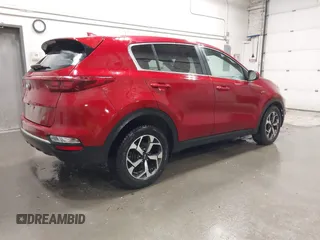 2020 Kia Sportage LX with VIN KNDPMCAC7L7809195, listed as a IAAI auction lot 41976306 with 59,648 mi miles. Bid and sale history available at carsss.com. Image 4.