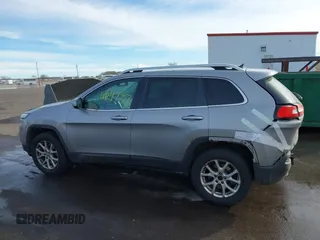 2014 Jeep Cherokee Latitude with VIN 1C4PJMCS9EW122196, listed as a IAAI auction lot 41649757 with 205,363 mi miles and . Bid and sale history available at DreamBid. Image 14.
