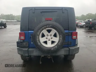 2009 Jeep Wrangler X with VIN 1J4FA24109L712701, listed as a Copart auction lot 60800855 with 156,709 mi miles and Salvage title. Bid and sale history available at DreamBid. Image 6.