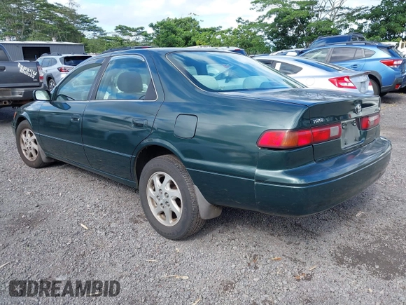 1999 Toyota Camry LE z VIN JT2BF22K2X0164080, wystawiony jako IAAI lot #40984874 z przebiegiem Nie podano mil oraz . Historia ofert i sprzedaży dostępna na DreamBid. Obrazek 3.