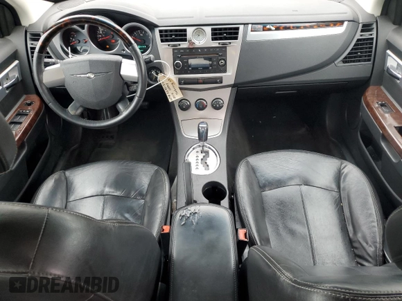 2010 Chrysler Sebring Limited z VIN 1C3CC5FB5AN172298, wystawiony jako Copart lot #52951805 z przebiegiem 146 996 mil mil oraz Szkoda całkowita • Salvage title. Historia ofert i sprzedaży dostępna na DreamBid. Obrazek 8.