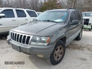 1999 Jeep Grand Cherokee Laredo с VIN 1J4G258S8XC650533, выставлен на аукционе IAAI как лот 41583331 с пробегом 245 164 миль миль и . История ставок и продаж доступна на DreamBid. Изображение 2.