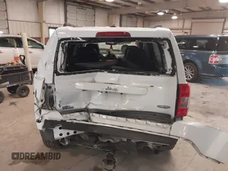 2014 Jeep Patriot Latitude with VIN 1C4NJPFA3ED739925, listed as a IAAI auction lot 41623546 with 130,374 mi miles and . Bid and sale history available at carsss.com. Image 6.