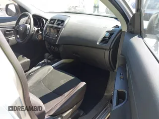 2014 Mitsubishi Outlander Sport ES with VIN 4A4AP3AUXEE003879, listed as a IAAI auction lot 41862379 with 65,297 mi miles. Bid and sale history available at carsss.com. Image 5.