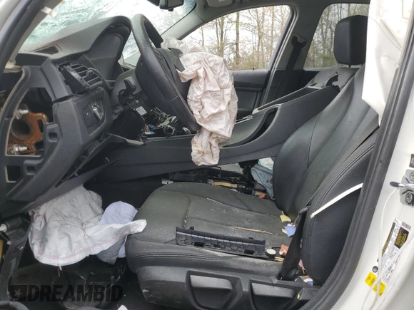 2012 BMW 3 Series 328i с VIN WBA3C1C51CF433150, выставлен на аукционе Copart как лот 52412865 с пробегом Не указан миль и Списание • Salvage title. История ставок и продаж доступна на DreamBid. Изображение 7.