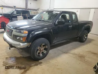 2009 GMC Canyon Work Truck z VIN 1GTDT19E798132510, wystawiony jako Copart lot #57361995 z przebiegiem 240 338 mil mil oraz Czysty tytuł • Clean title. Historia ofert i sprzedaży dostępna na DreamBid. Obrazek 1.