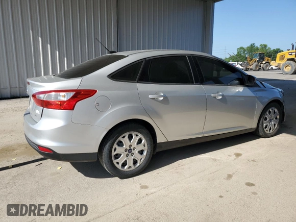 2012 Ford Focus SE with VIN 1FAHP3F29CL161559, listed as a Copart auction lot 61695575 with 127,412 mi miles and Salvage title. Bid and sale history available at DreamBid. Image 3.
