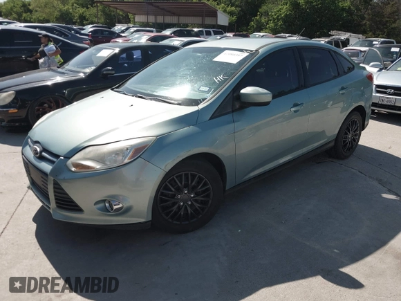 2012 Ford Focus SE with VIN 1FAHP3F20CL356322, listed as a IAAI auction lot 42088397 with 130,600 mi miles. Bid and sale history available at carsss.com. Image 2.