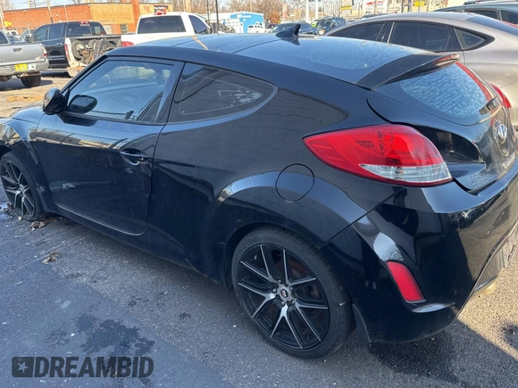 2014 Hyundai Veloster with VIN KMHTC6AD7EU184728, listed as a Copart auction lot 88989725 with 95,191 mi miles and Clean Title. Bid and sale history available at carsss.com. Image 3.