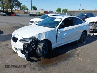 2016 BMW 2 Series M235i with VIN WBA1J7C5XGV359562, listed as a IAAI auction lot 39990299 with 54,022 mi miles. Bid and sale history available at carsss.com. Image 17.