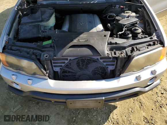 2001 BMW X5 4.4i with VIN WBAFB33581LH13564, listed as a Copart auction lot 74357004 with 0 mi miles and Salvage Title. Bid and sale history available at carsss.com. Image 12.
