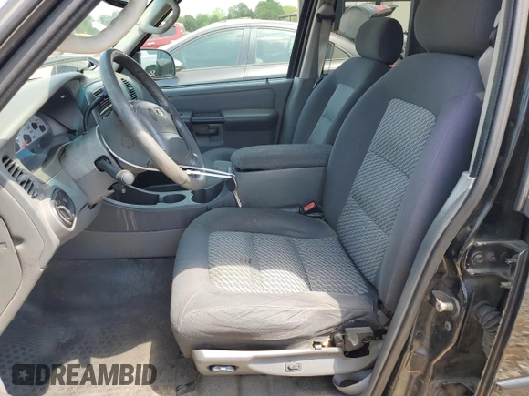 2005 Ford Explorer Sport Trac XLS with VIN 1FMZU67K65UA29830, listed as a Copart auction lot 54941185 with 214,220 mi miles and Salvage title. Bid and sale history available at DreamBid. Image 7.