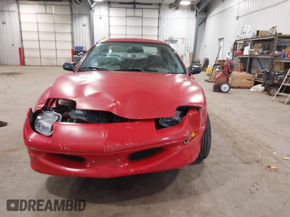 1999 Pontiac Sunfire SE z VIN 1G2JB524XX7547651, wystawiony jako IAAI lot #41962158 z przebiegiem 130 385 mil mil oraz . Historia ofert i sprzedaży dostępna na DreamBid. Obrazek 12.