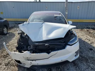 2017 Tesla Model X 90D with VIN 5YJXCBE21HF054304, listed as a Copart auction lot 48428795 with Not Provided miles and Clean Title. Bid and sale history available at carsss.com. Image 5.