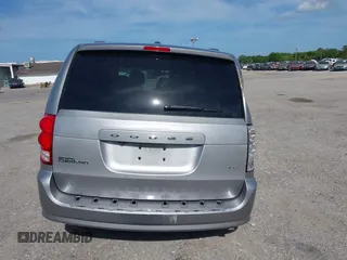2014 Dodge Grand Caravan SXT with VIN 2C4RDGCG3ER193688, listed as a IAAI auction lot 41290544 with 73,092 mi miles and . Bid and sale history available at DreamBid. Image 17.
