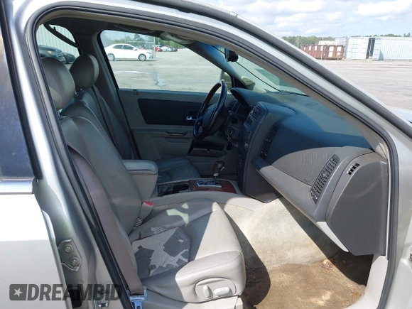 2004 Cadillac SRX with VIN 1GYDE63A740111607, listed as a IAAI auction lot 41918519 with 239,042 mi miles. Bid and sale history available at carsss.com. Image 5.