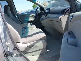 2010 Honda Odyssey EX with VIN 5FNRL3H44AB059711, listed as a IAAI auction lot 42057760 with 225,486 mi miles and . Bid and sale history available at DreamBid. Image 5.