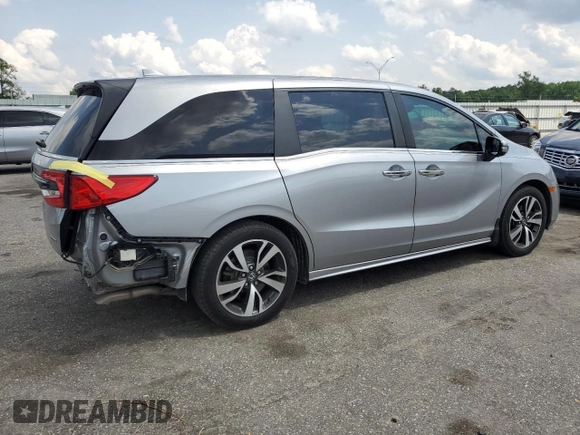 2021 Honda Odyssey Touring z VIN 5FNRL6H85MB039444, wystawiony jako Copart lot #57142205 z przebiegiem 74 228 mil mil oraz Szkoda całkowita • Salvage title. Historia ofert i sprzedaży dostępna na DreamBid. Obrazek 3.