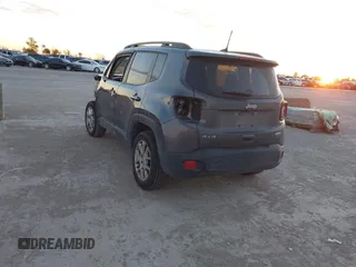 2021 Jeep Renegade Latitude with VIN ZACNJDBB0MPN13884, listed as a IAAI auction lot 40957052 with 52,023 mi miles. Bid and sale history available at carsss.com. Image 3.