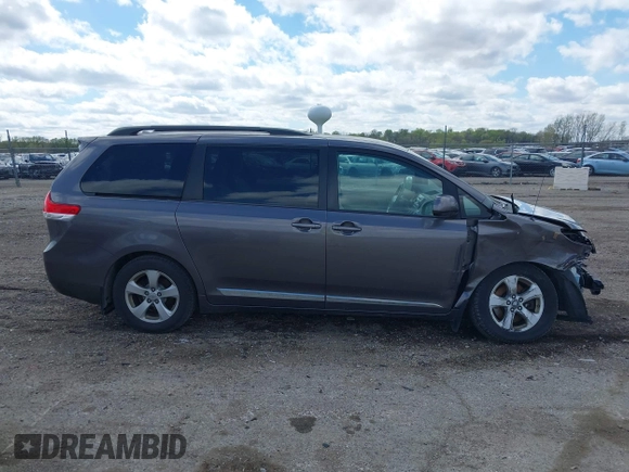 2012 Toyota Sienna LE AAS with VIN 5TDKK3DC5CS270481, listed as a IAAI auction lot 42093687 with 208,899 mi miles. Bid and sale history available at carsss.com. Image 13.