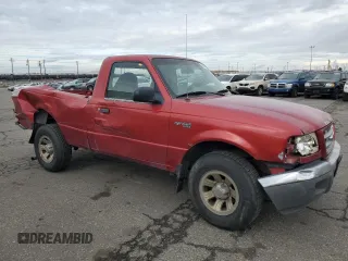 2001 Ford Ranger XL with VIN 1FTYR10C61TA40124, listed as a Copart auction lot 48943325 with 196,810 mi miles and Salvage title. Bid and sale history available at DreamBid. Image 4.