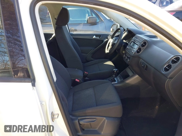 2012 Volkswagen Tiguan SE with VIN WVGAV7AX9CW590965, listed as a IAAI auction lot 41852407 with 153,953 mi miles and . Bid and sale history available at DreamBid. Image 5.