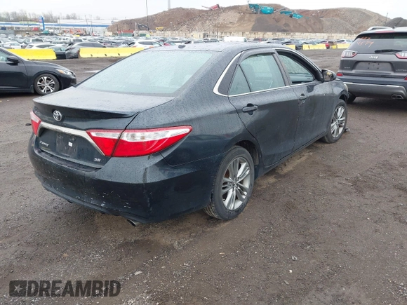 2015 Toyota Camry XLE with VIN 4T1BF1FK1FU087653, listed as a IAAI auction lot 41942940 with 180,274 mi miles. Bid and sale history available at carsss.com. Image 4.