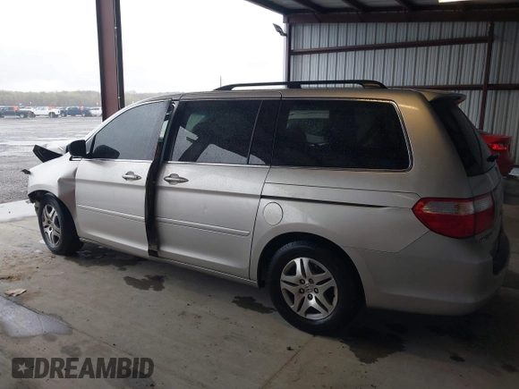 2007 Honda Odyssey EX with VIN 5FNRL384X7B451892, listed as a IAAI auction lot 42020537 with 162,257 mi miles and . Bid and sale history available at DreamBid. Image 14.
