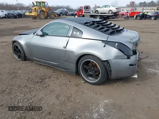2003 Nissan 350Z Touring z VIN JN1AZ34E33T003711, wystawiony jako IAAI lot #41351191 z przebiegiem 167 503 mil mil oraz . Historia ofert i sprzedaży dostępna na DreamBid. Obrazek 3.