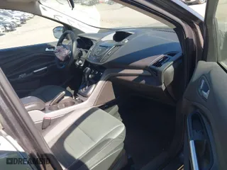 2015 Ford Escape SE with VIN 1FMCU0G73FUC19777, listed as a IAAI auction lot 41656508 with 200,000 mi miles. Bid and sale history available at carsss.com. Image 5.
