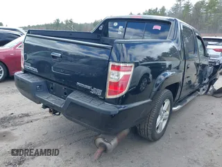 2013 Honda Ridgeline RTL with VIN 5FPYK1F50DB010368, listed as a IAAI auction lot 42048645 with 131,399 mi miles and . Bid and sale history available at DreamBid. Image 4.