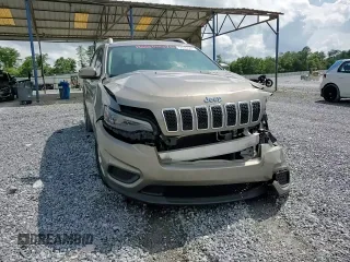 2020 Jeep Cherokee Latitude with VIN 1C4PJLCBXLD556789, listed as a Copart auction lot 58582565 with 66,865 mi miles and Salvage title. Bid and sale history available at DreamBid. Image 14.