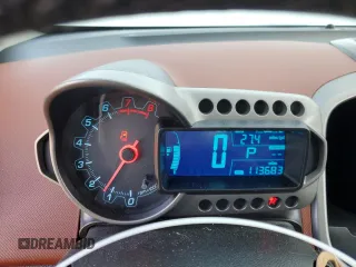 2015 Chevrolet Sonic LTZ z VIN 1G1JE5SB5F4106391, wystawiony jako Copart lot #41699175 z przebiegiem 113 683 mil mil oraz Szkoda całkowita • Salvage title. Historia ofert i sprzedaży dostępna na DreamBid. Obrazek 9.