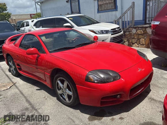 1999 Mitsubishi 3000GT GT z VIN JA3AM84J3XY001387, wystawiony jako Copart lot #61198735 z przebiegiem 137 514 mil mil oraz Czysty tytuł • Clean title. Historia ofert i sprzedaży dostępna na DreamBid. Obrazek 1.