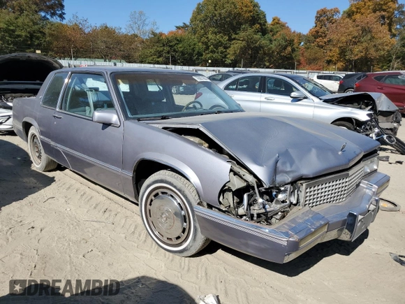 1990 Cadillac DeVille z VIN 1G6CD1339L4358825, wystawiony jako Copart lot #76901884 z przebiegiem 169 956 mil mil oraz Szkoda całkowita • Salvage title. Historia ofert i sprzedaży dostępna na DreamBid. Obrazek 4.
