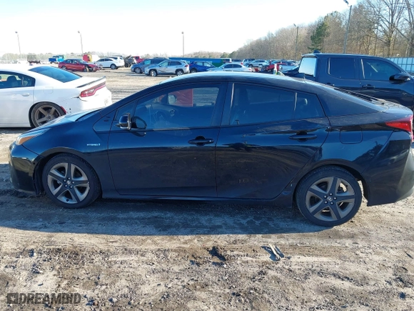 2019 Toyota Prius L Eco with VIN JTDKARFU9K3091887, listed as a IAAI auction lot 41282017 with 240,000 mi miles. Bid and sale history available at carsss.com. Image 6.
