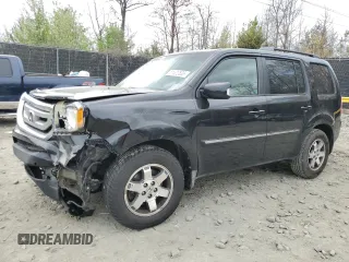 2009 Honda Pilot Touring z VIN 5FNYF38879B008138, wystawiony jako Copart lot #51622835 z przebiegiem 215 563 mil mil oraz Szkoda całkowita • Salvage title. Historia ofert i sprzedaży dostępna na DreamBid. Obrazek 1.