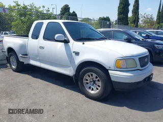 2001 Ford F-150 XL z VIN 1FTRX07L21KA76215, wystawiony jako IAAI lot #42374615 z przebiegiem 195 596 mil mil oraz . Historia ofert i sprzedaży dostępna na DreamBid. Obrazek 1.