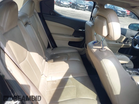 2013 Dodge Avenger SXT with VIN 1C3CDZCB7DN650959, listed as a IAAI auction lot 42592881 with 107,652 mi miles and . Bid and sale history available at DreamBid. Image 8.